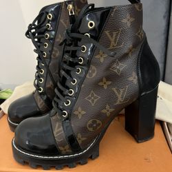 lv boots and gucci heels