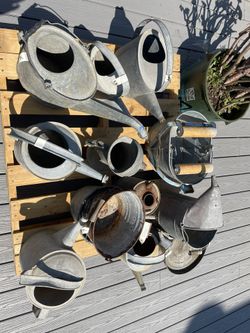 Vintage Oil And Watering Cans