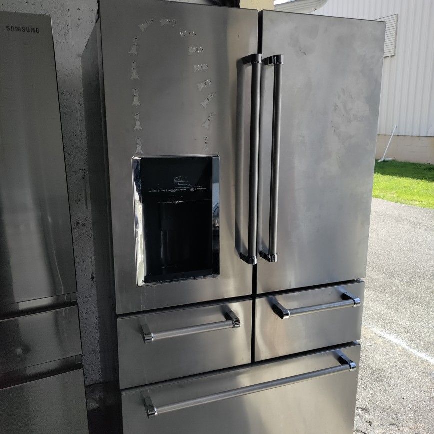 like new KitchenAid stainless five-door fridge works perfect with warranty