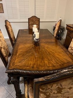 Dinning Table with extension , 8 chairs. Seats 8