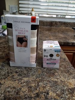 Never used  box  of multi colored womes underwear and  two pair of Black panty Hose