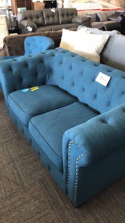 Tufted love seat