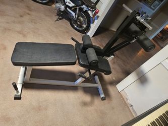 Leg raise adjustable bench