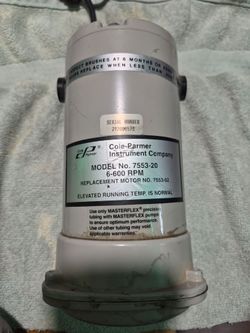 This is a Cole-Parmer Masterflex 7553-20 peristaltic pump drive motor.