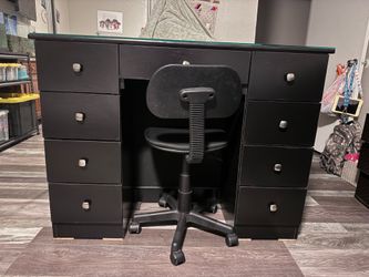 9 drawer vanity desk with glass top.