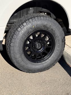 Method MR703 17x8.5 6x139.7 wheels 285/70R17 Toyo A/T III tires