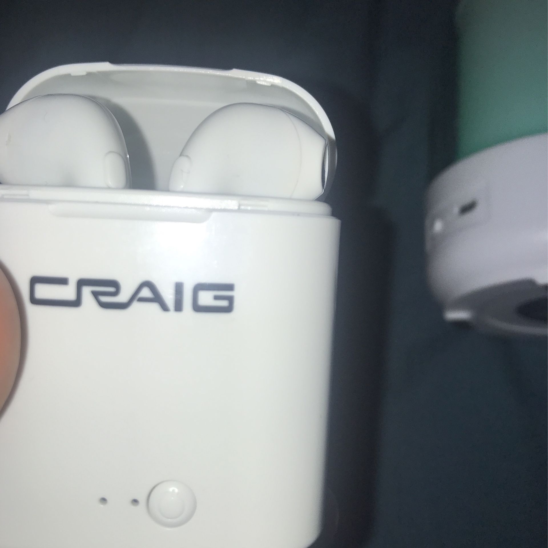 Bluetooth Headphones And A Bluetooth Speaker