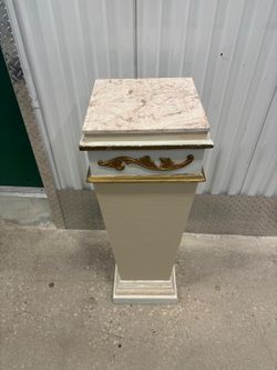 Pink Marble top pedestal. 12” x 12” , 37” high $75