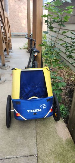 Trek blue and yellow child bicycle trailer