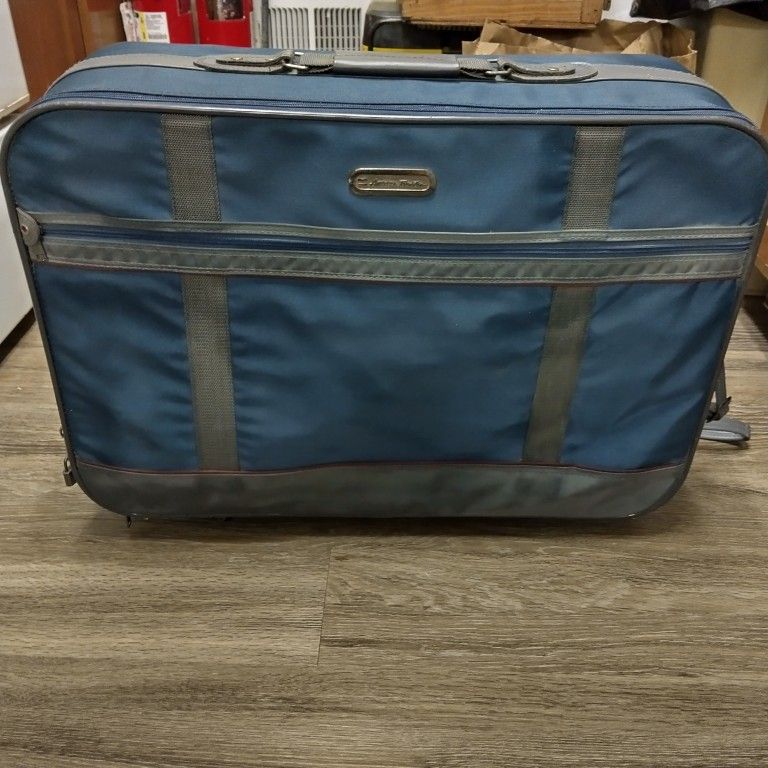 American Tourist Suitcase And Travel Bag