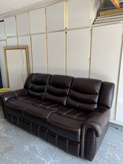 RECLINABLE BROWN LEATHER COUCH