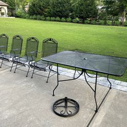 REFINISHED 5 ft Wrought Iron table with 4 rocking chairs, heavy and great conditions $499 CAN DELIVER!