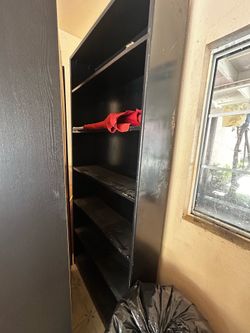 Dark brown/black bookshelf