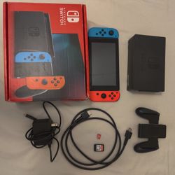 Nintendo Switch w/ 128GB SD & Super Smash Bros.