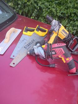 2 drills and 2 hand saws  , masonry tool