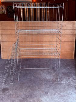 Five shelf wire racks 35 x 18“ at $20 each