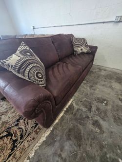 Suede Sleeper Sofa with Queen Pull-Out Bed from Ashley Furniture
Delivery options available