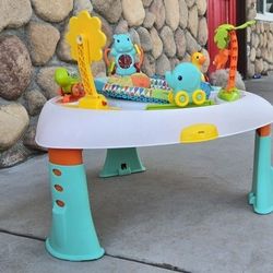 Infantino:  2 In 1 Spin Entertainment Table & Stand.