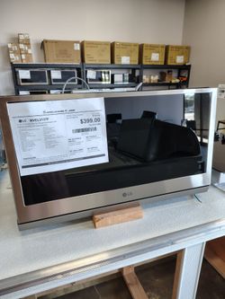 LG ThinQ 2.1cu Smart over the range microwave extenda vent