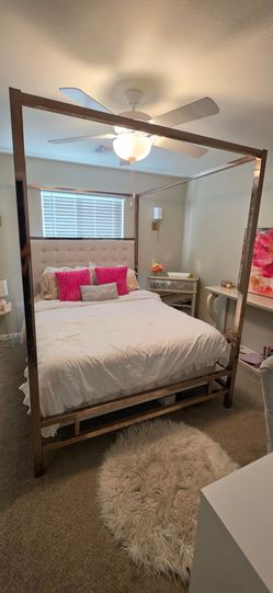 Gold metal frame queen bed with upholstered head board