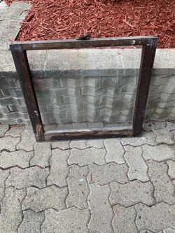 Vintage wooden window. Original lock and glass.