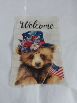 Welcome garden flag with the American flag bear