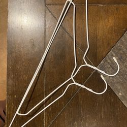 Two White Metal Hangers 