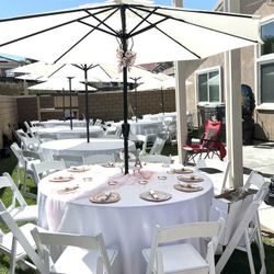 Umbrella sets includes tables, umbrella, plastic folding chairs, Heaters and linens for your next party R. E. N.     T. A.    L. 