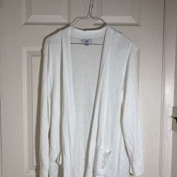 A white cotton cardigan with two pockets
