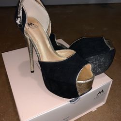 Heels black and gold. Size 6.5. Brand is Madison.
