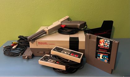 Nintendo - Original NES (1985) with two controllers, Nintendo Zapper, and Super Mario Bros / Duck Hunt