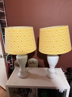 Pair of lamps and wall art
