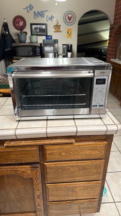 Like New- Oster brand toaster oven with Turbo Convection