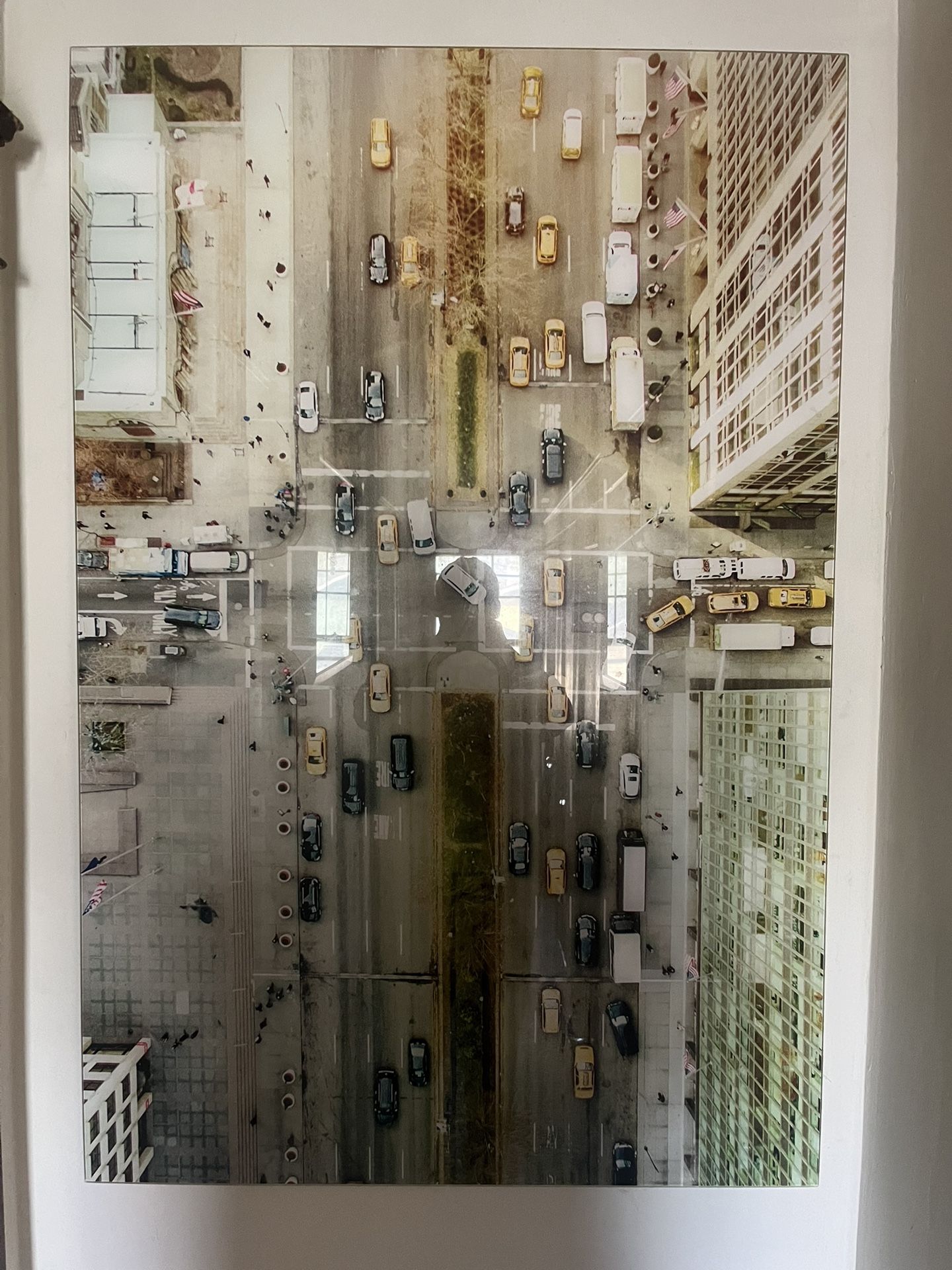 This picture was taken many years ago with our old World Trade Center before it collapsed from a helicopter professional photograph. It is glass askin