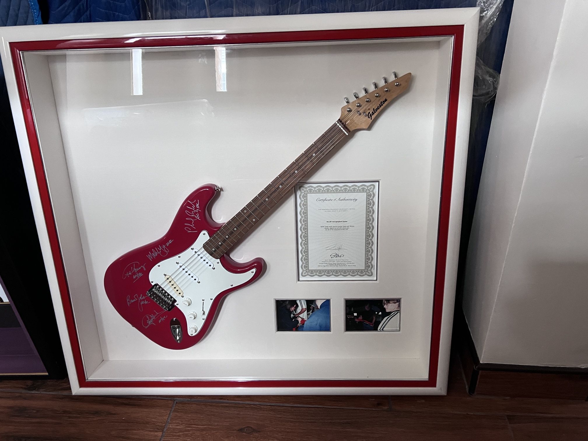 AC/DC AUTOGRAPHED GALVESTON STRAT STYLE ELECTRIC GUITAR SHADOW BOXED WITH CERTIFICATE OF AUTHENTICITY