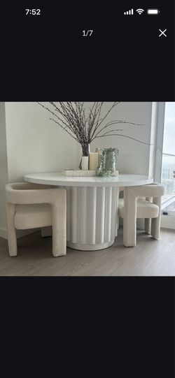 White metal round dining table
