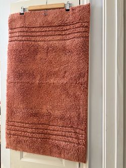 One new bath rug and One New Shower Curtain Rod/ Curtain Hooks Not Included