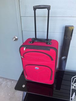 Great deal great condition Red American tourister 20” length suitcase 🧳 luggage on wheels 🛞