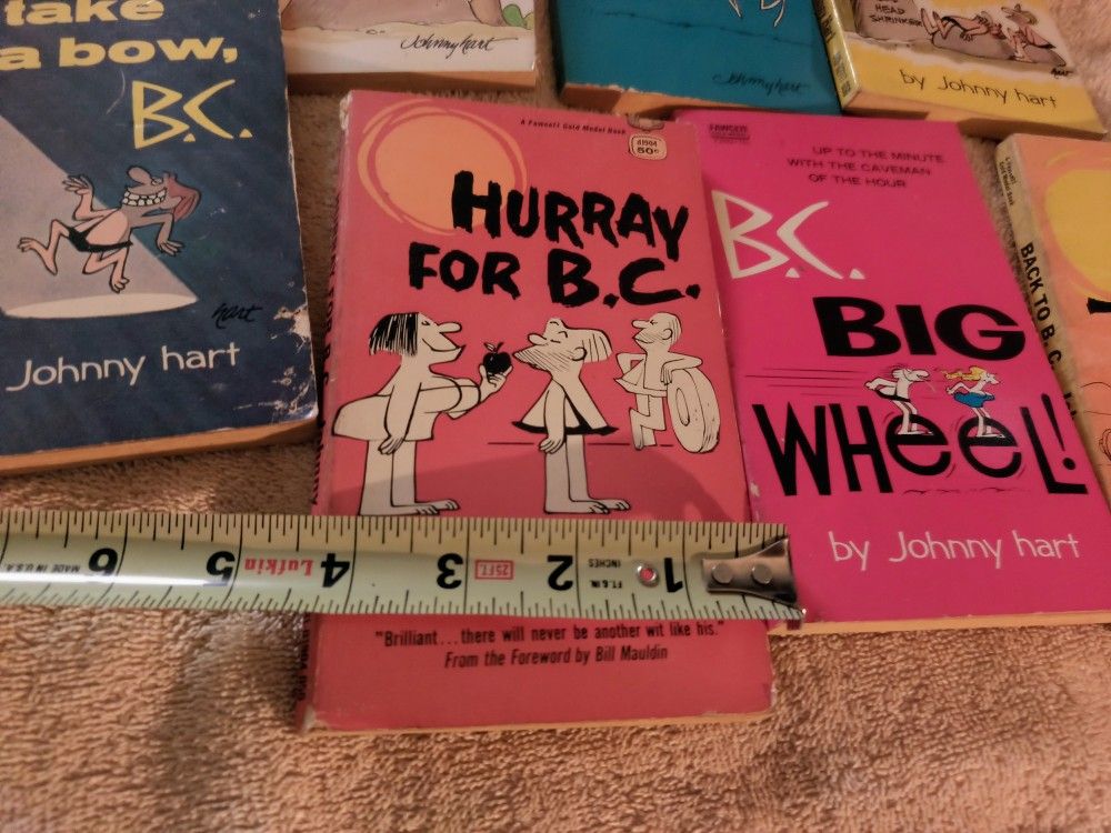 COMIC BOOKS 7 INCHES TALL, 4 INCH WIDE