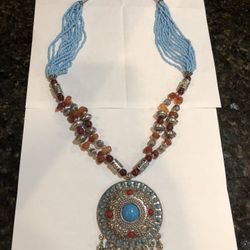 Beautiful boho oriental beaded metal pendant necklace light blue brown