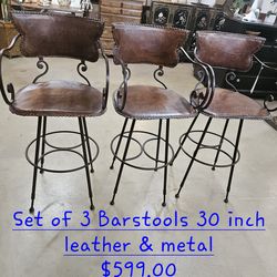 Barstools set of 3 leather & metal We are located at 2811 East Bell road. Another Time Around Furniture.
