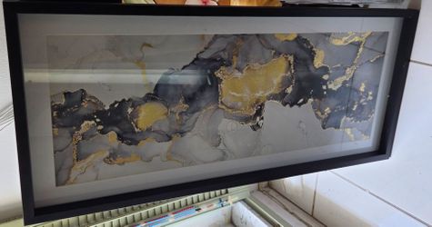 Framed Abstract Alcohol‑Ink Wall Art 40"×18"
Modern framed abstract alcohol‑ink artwork, black gray and gold foil accents. Frame size 40 inch wide ×18