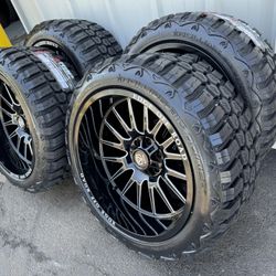 NEW 22x12 gloss black/milled wheels wrapped in RBP 33x12.50r22 tires
