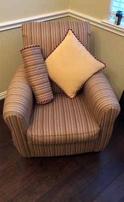 A SET of custom-covered sitting chairs- in excellent condition- comes with 2 matching pillows per chair. Would go great in an office or a nice sittin