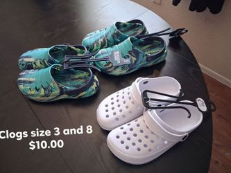 Bran New clogs     $10.00 each one white ones are size 8. And green 3
