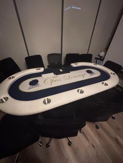Poker table with chairs