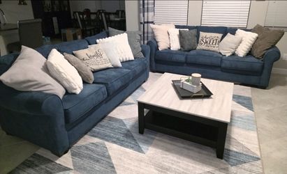 Two 3 seater Blue Couches Rooms to Go