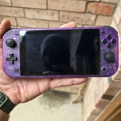 Atomic Purple Switch Lite With Oled Screen.