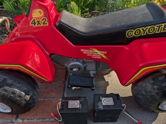 1986 Power Wheels Coyote ATV.Power: Uses 12-volt rechargeable batteries