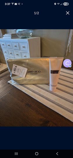 Brand New!! JIMMY CHOO  perfumed body lotion 5.5fl oz with cosmetic bag.